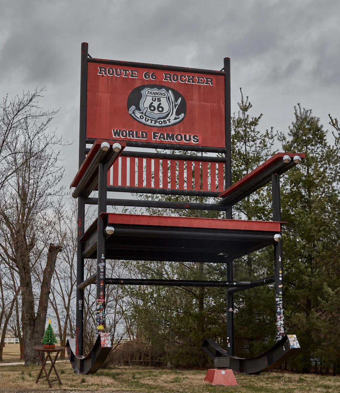 The towering Route 66 Rocker at Fanning, Missouri, with a small LEGO Christmas display in the foreground